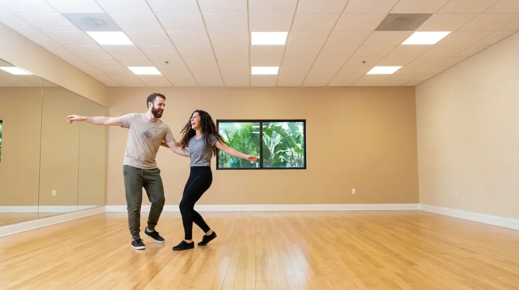 Couple dancing lindy hop in a Solana Beach studio