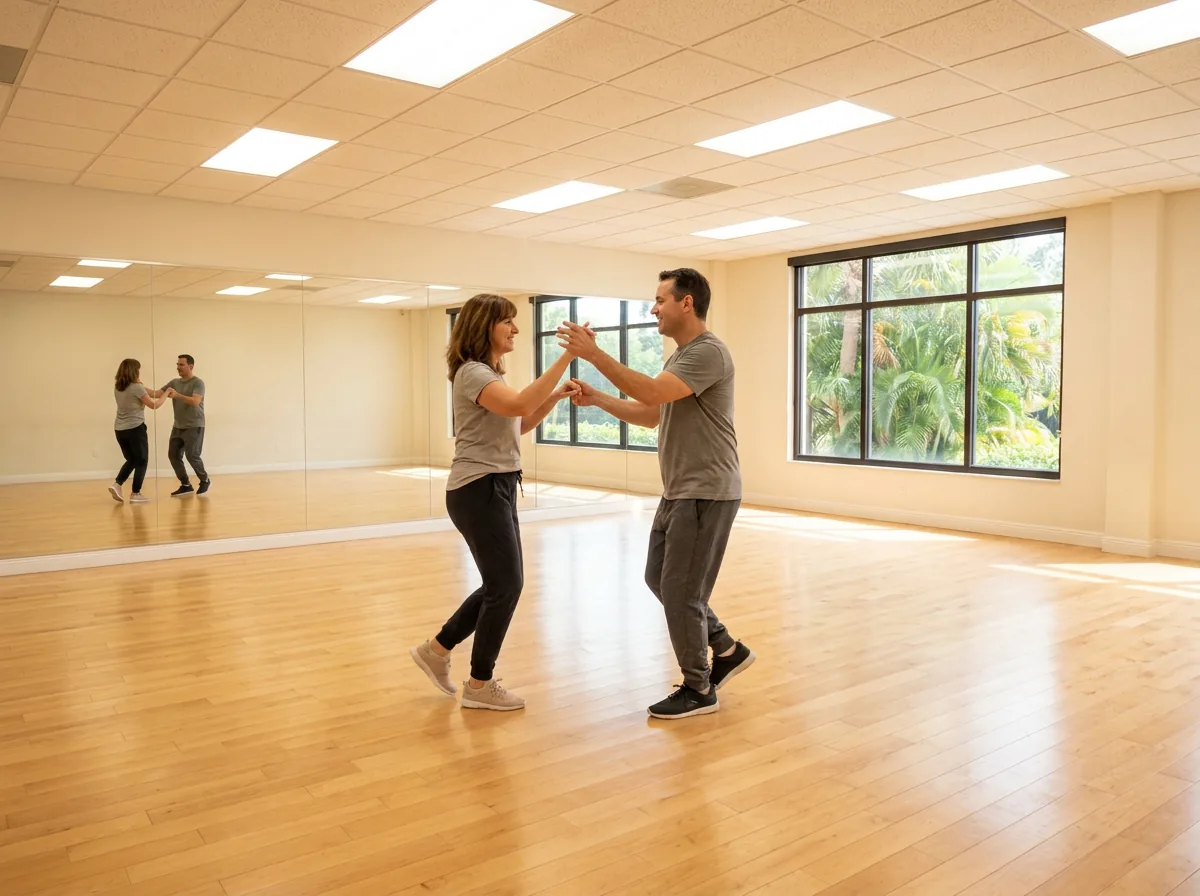 Instructor demonstrating mambo technique to a student in Solana Beach
