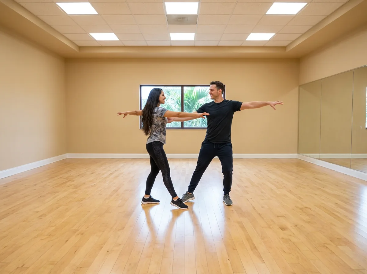 Instructor demonstrating paso doble technique to a student in Solana Beach