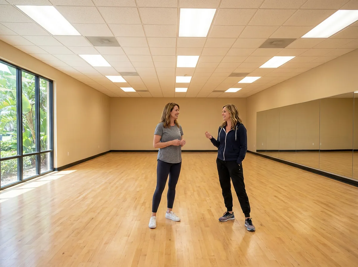 Instructor helping a student choose a rhythm dance style