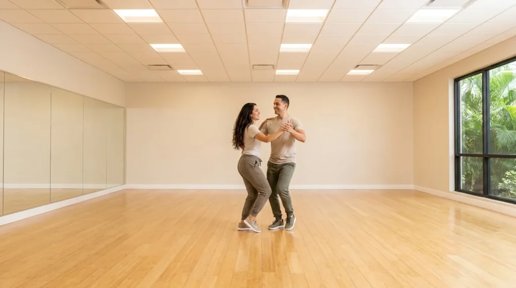 Couple dancing salsa in a Solana Beach studio