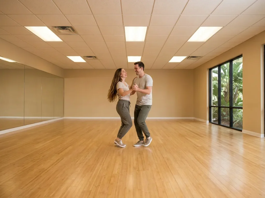 Couple dancing east coast swing in a Solana Beach studio