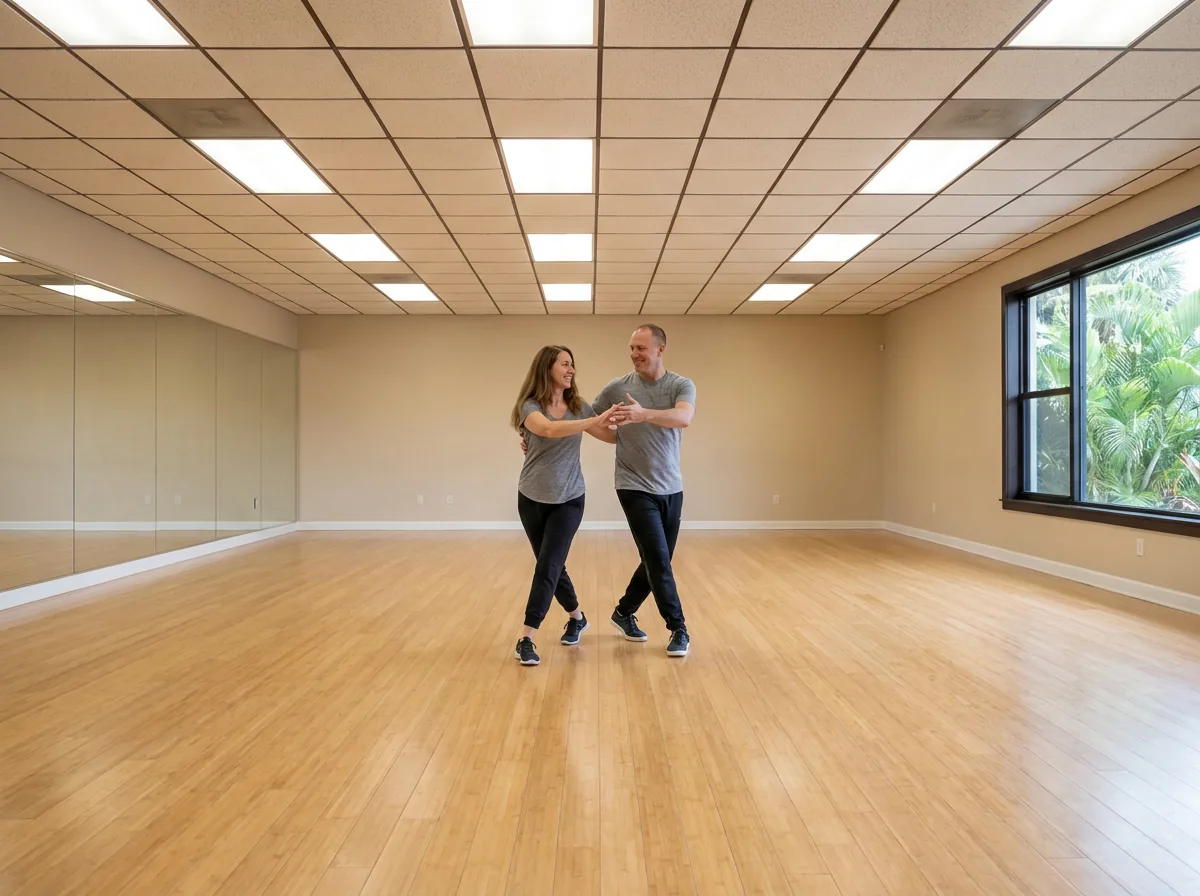Instructor demonstrating west coast swing technique to a student in Solana Beach